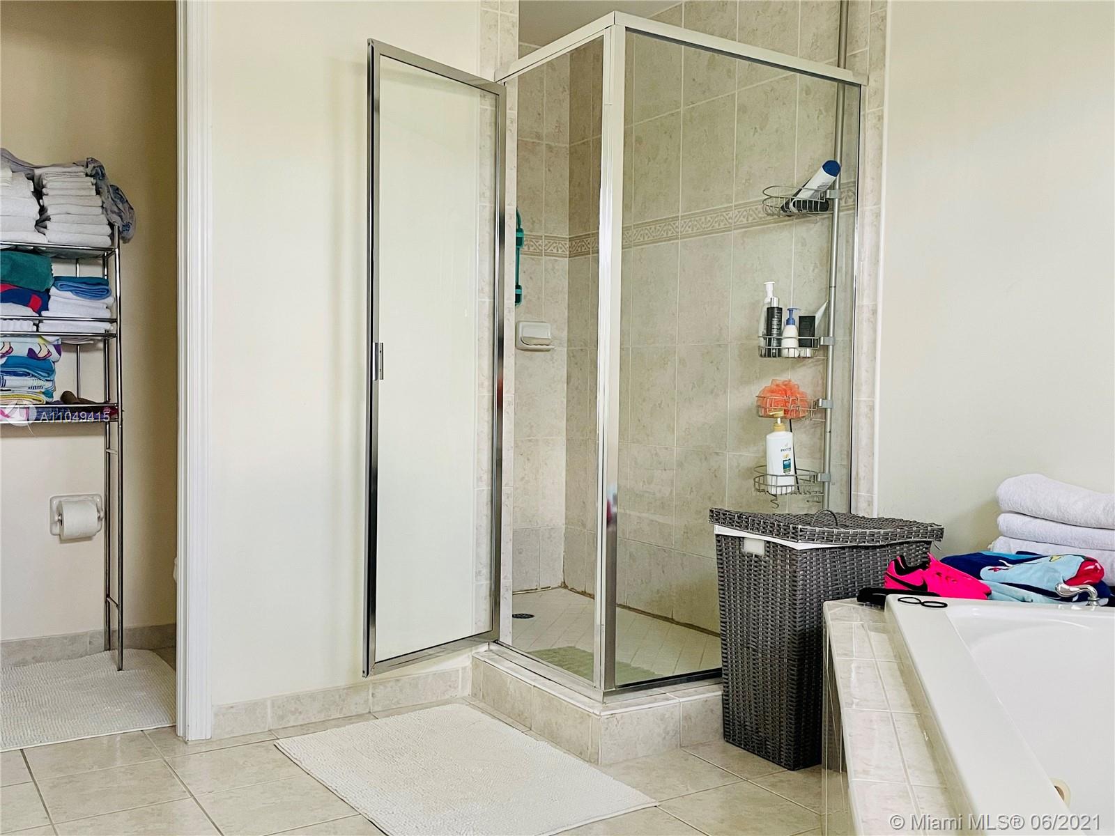 Aventura Aventura, FL 33180 - Photo 23 of 37 a room with a door and shower