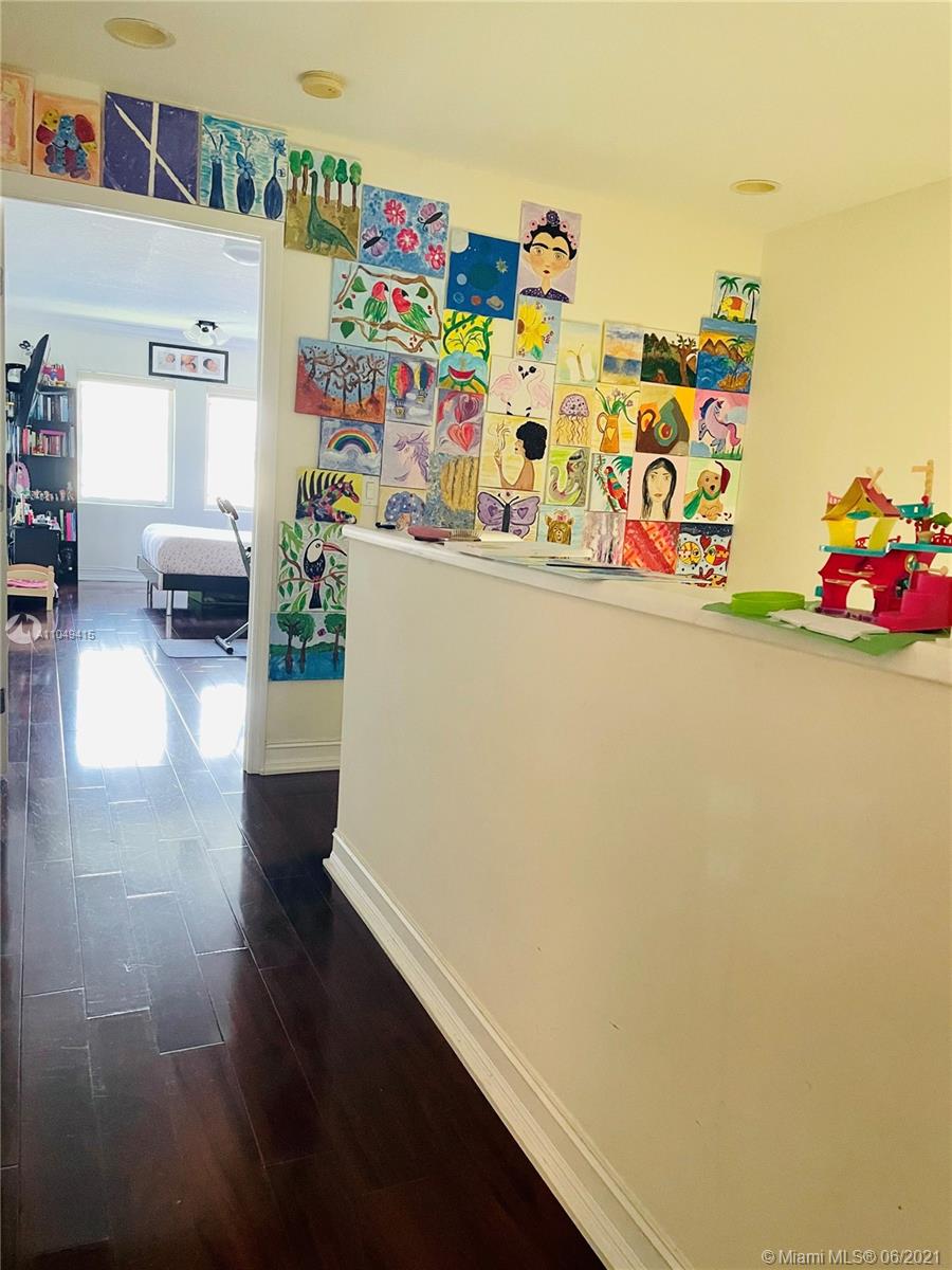 Aventura Aventura, FL 33180 - Photo 31 of 37 a room with toys and wooden floor