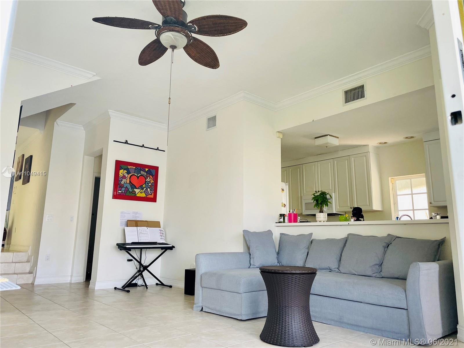 Aventura Aventura, FL 33180 - Photo 10 of 37 a living room with furniture and a chandelier