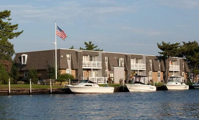 a view of living room with furniture and gym equipment