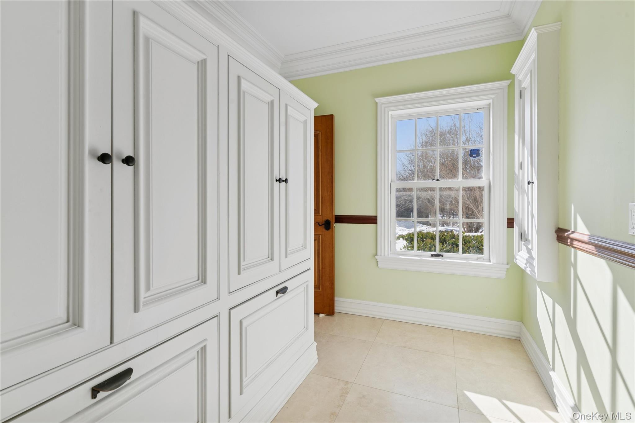 1680 Lands End Road Orient, NY 11957 - Photo 33 of 50 Dedicated Laundry Room with Custom Cabinetry