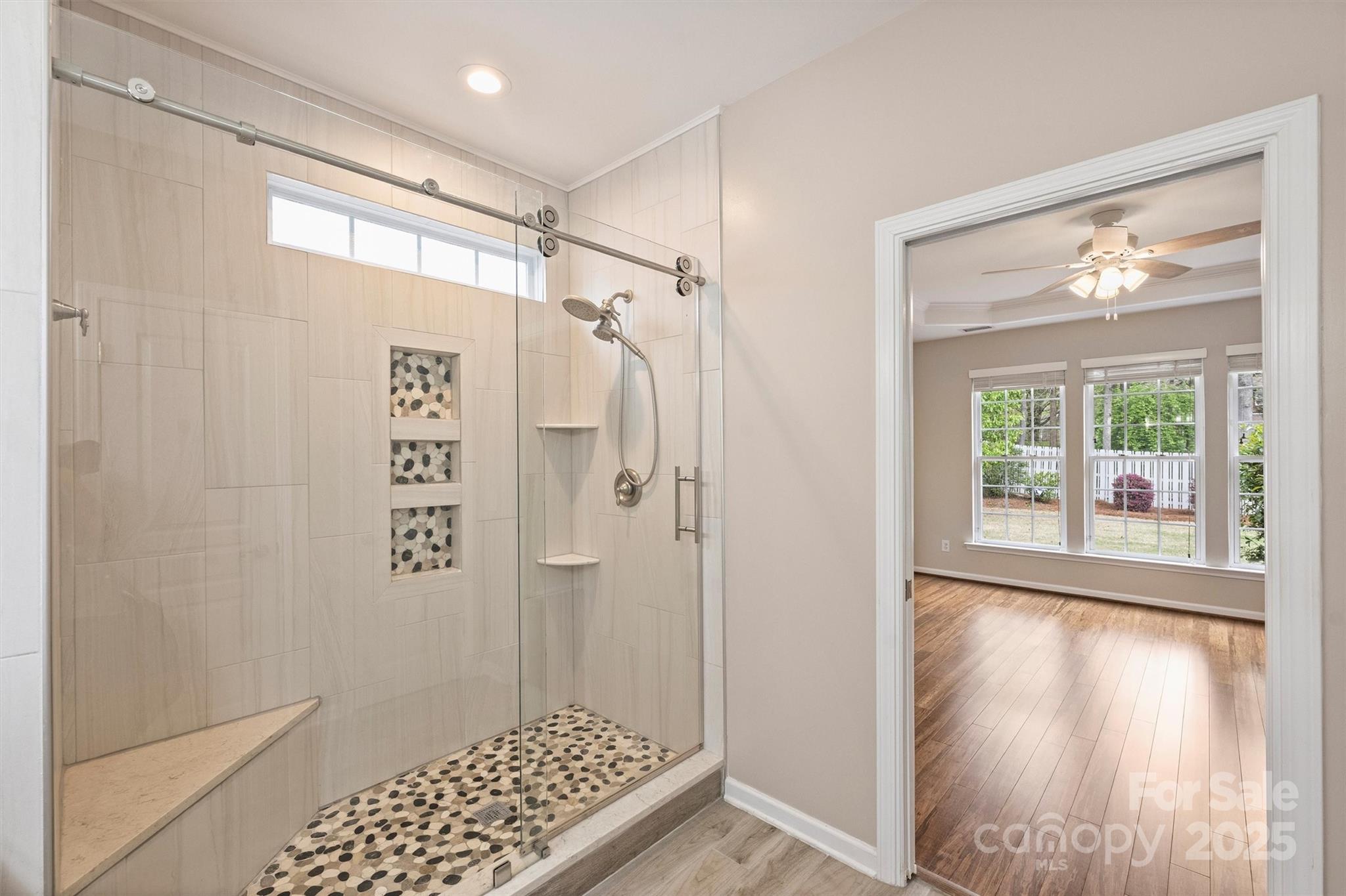 11422 Nevermore Way Charlotte, NC 28277 - Photo 22 of 34 a view of walk in closet with window