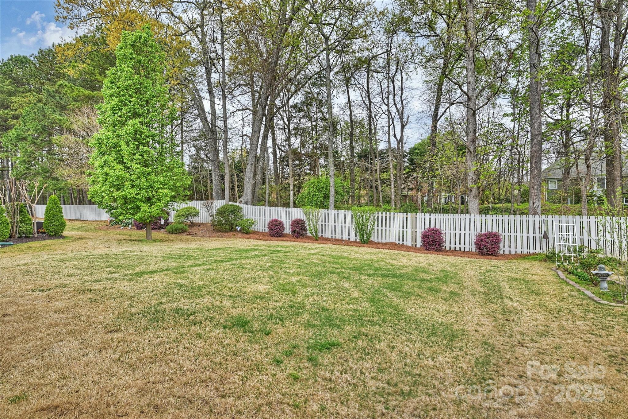11422 Nevermore Way Charlotte, NC 28277 - Photo 32 of 34 a backyard of a house with table and chairs