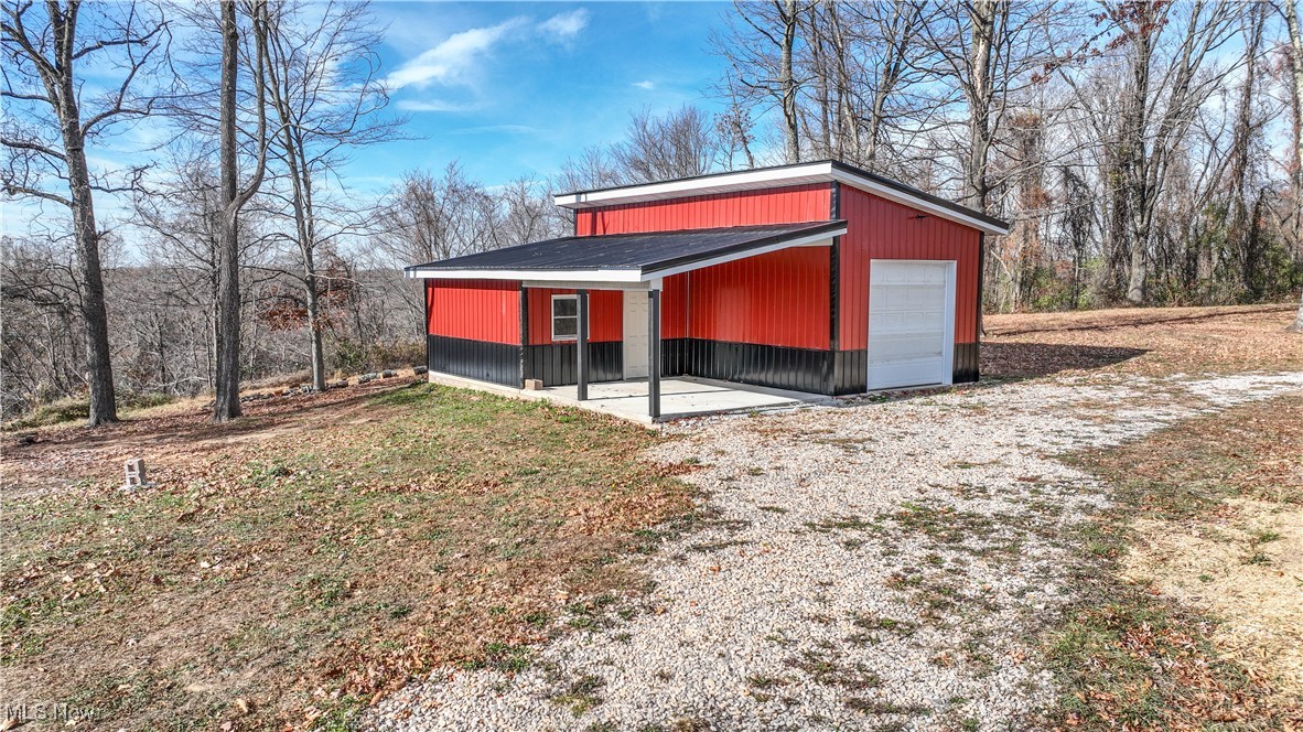 67480 Barnesville Hendrysburg Road Barnesville, OH 43713 - Photo 5 of 16 View of outdoor structure featuring a garage