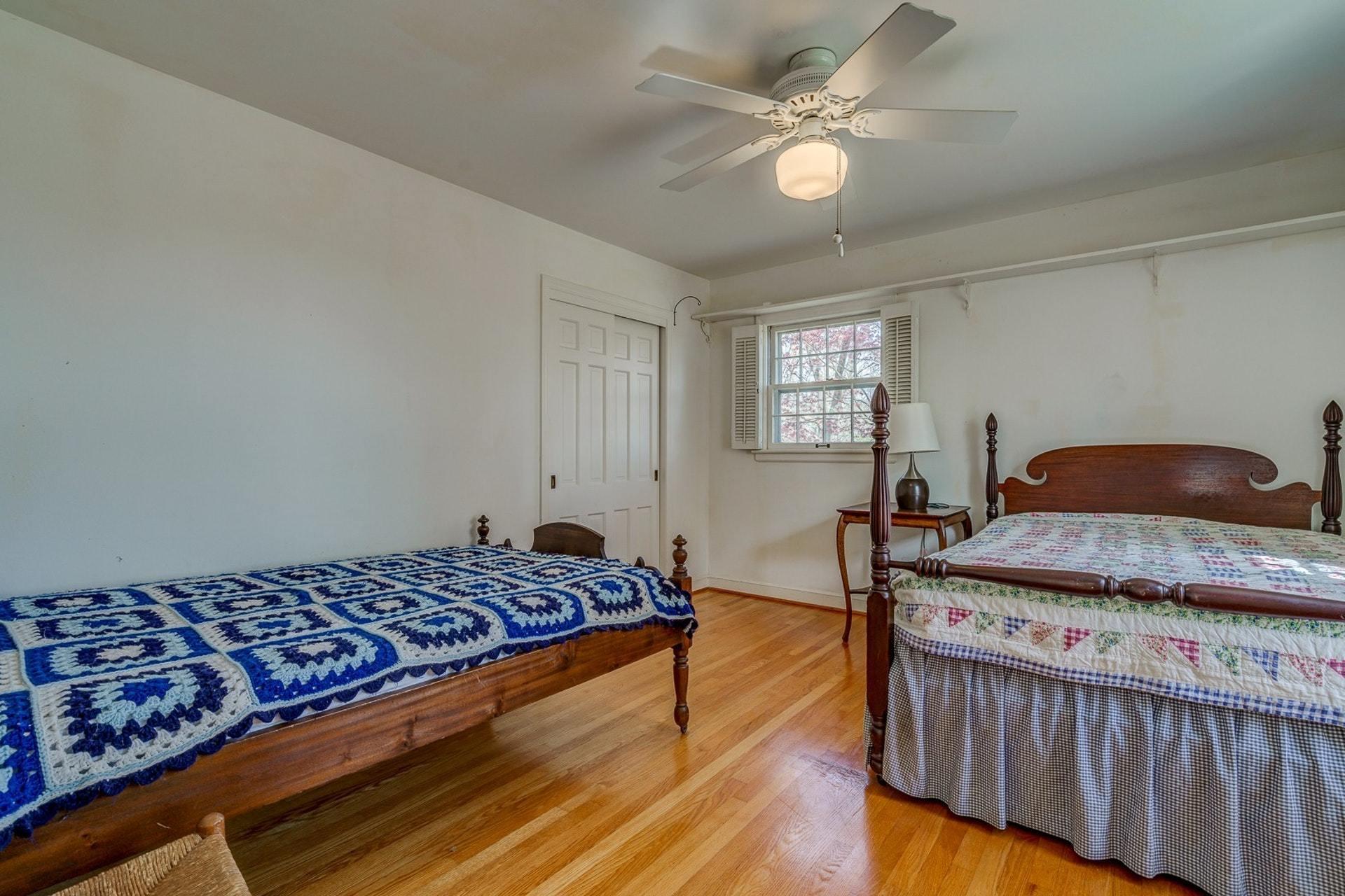5571 Highfields Road Roanoke, VA 24018 - Photo 16 of 45 a bedroom with a bed and window
