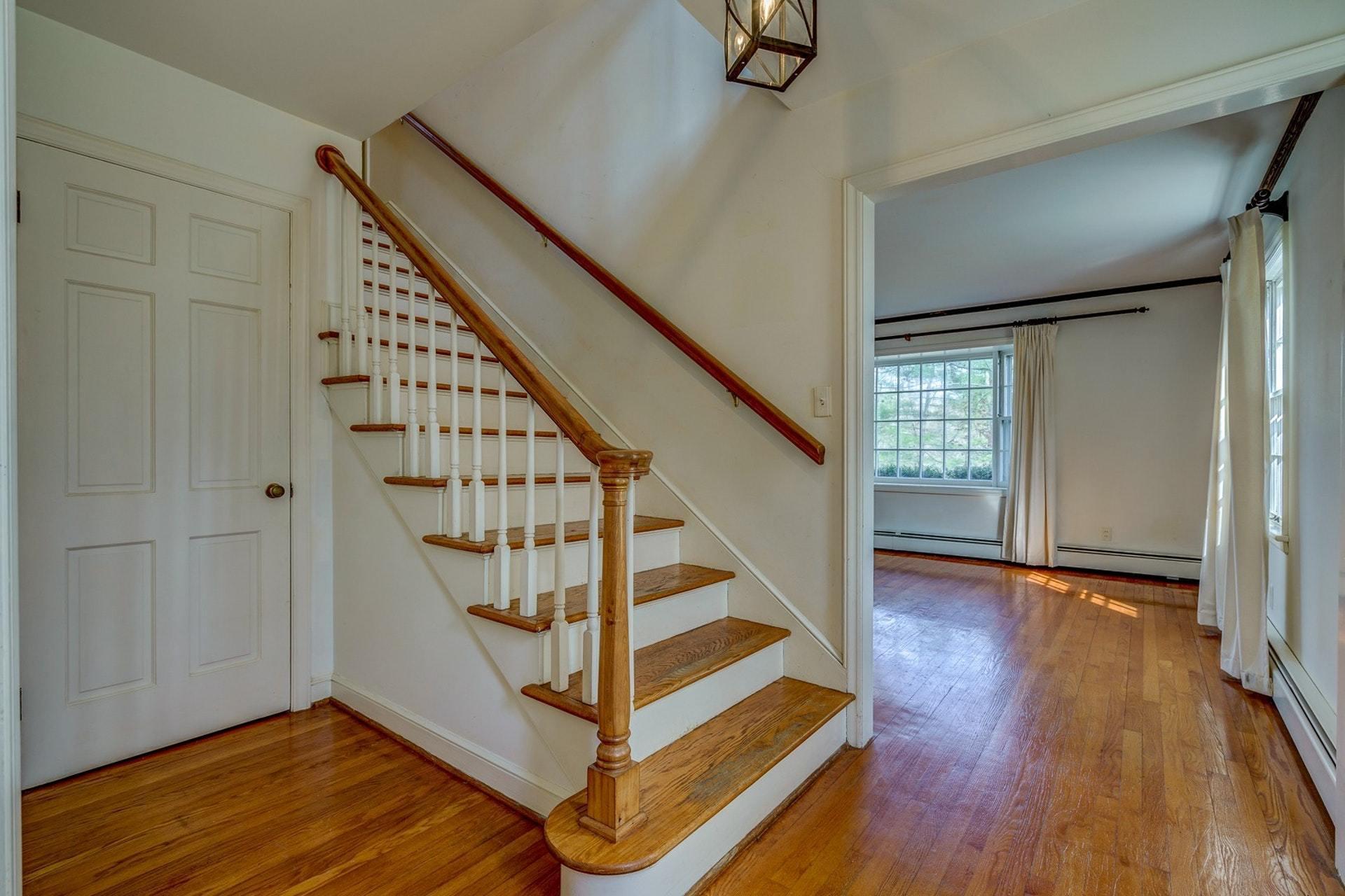 5571 Highfields Road Roanoke, VA 24018 - Photo 3 of 45 a view of entryway with wooden floor and stairs