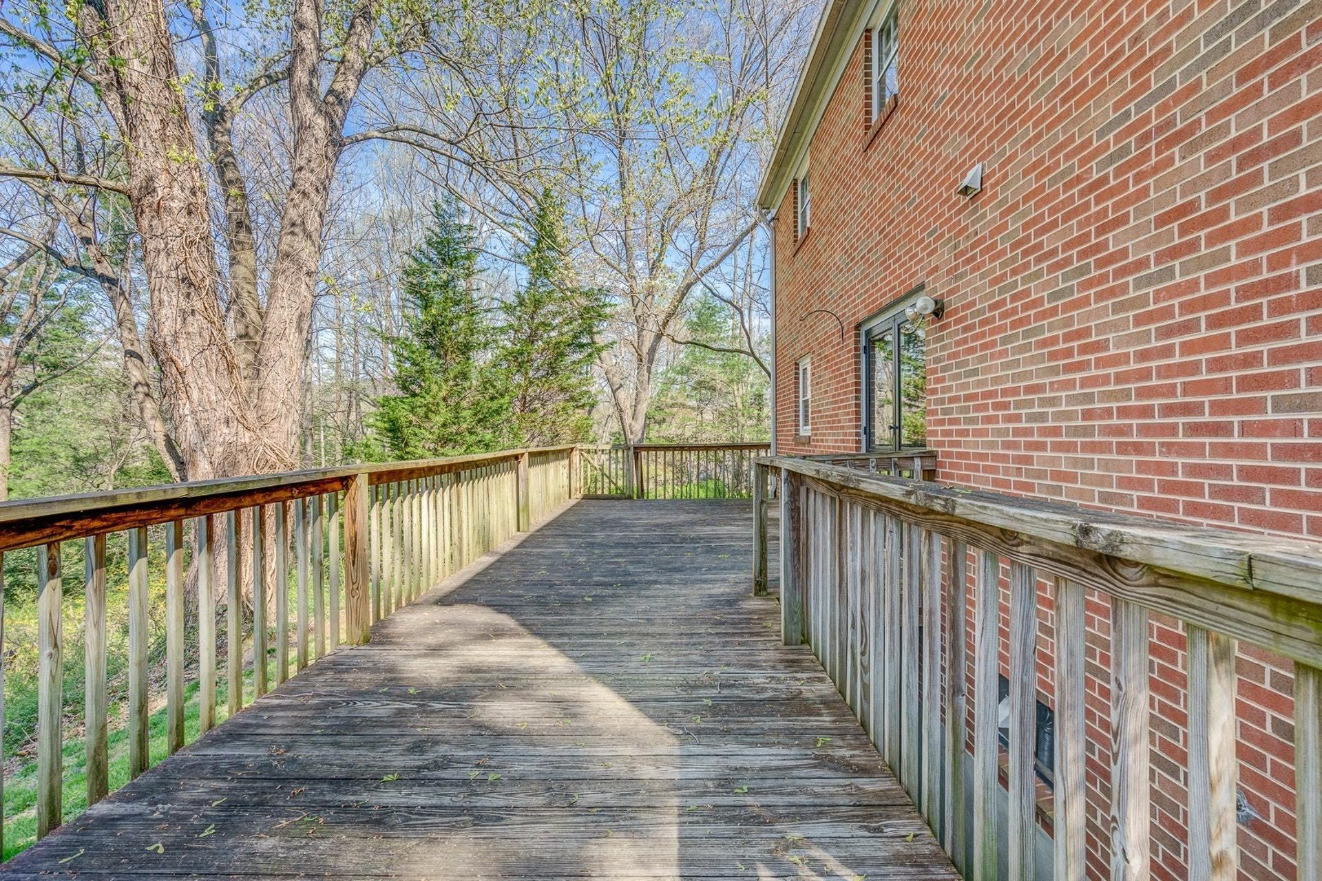 5571 Highfields Road Roanoke, VA 24018 - Photo 28 of 45 a view of balcony with wooden floor and fence
