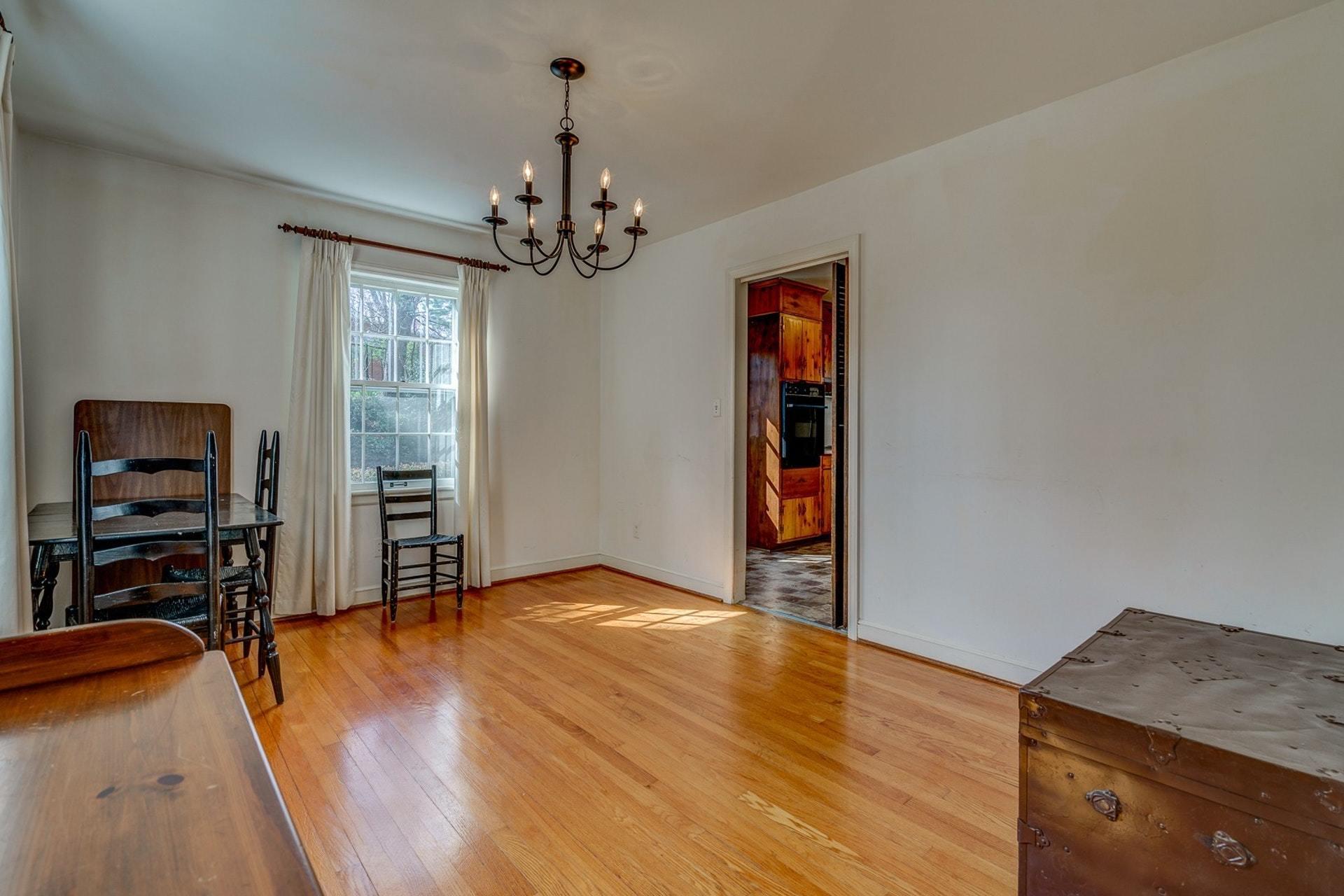 5571 Highfields Road Roanoke, VA 24018 - Photo 7 of 45 a view of a livingroom with a furniture hardwood floor and a ceiling fan