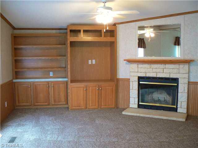 216 Nance Road Denton, NC 27239 - Photo 13 of 16 Den/Family/Great Room. What a neat room for family fun! This room is 14 5" x 30 and has lots of built-in storage for books, games, sound equipment, TV or whatever you choose. There are double glass doors to outside and good natural light too.