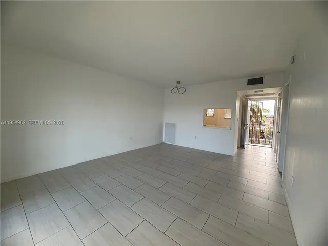 en empty room with windows