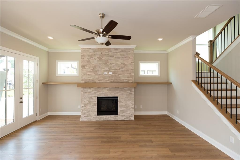 5590 Broad River View Peachtree Corners, GA 30092 - Photo 11 of 37 a view of an empty room with wooden floor and a window