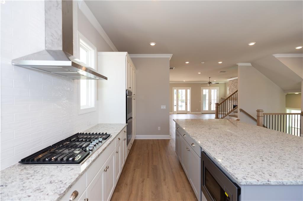 5590 Broad River View Peachtree Corners, GA 30092 - Photo 12 of 37 a kitchen with sink stove and refrigerator