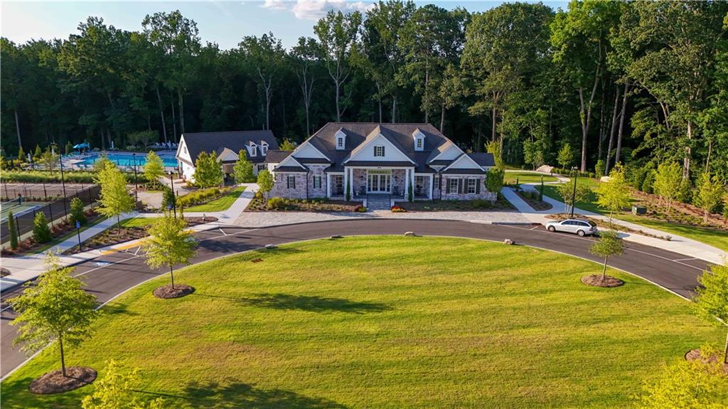 5590 Broad River View Peachtree Corners, GA 30092 - Photo 21 of 37 a view of swimming pool with lawn chairs and wooden fence