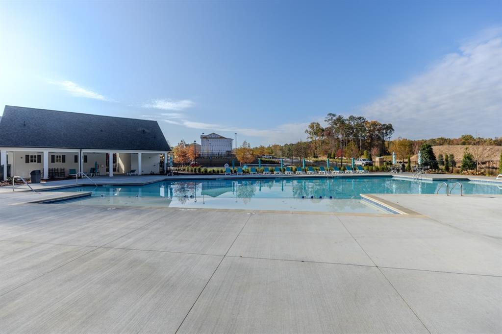 5590 Broad River View Peachtree Corners, GA 30092 - Photo 29 of 37 a view of swimming pool in front of residential houses