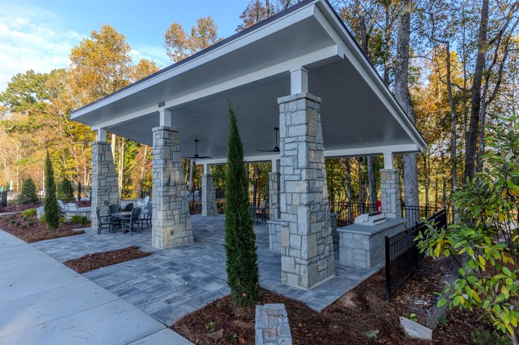5590 Broad River View Peachtree Corners, GA 30092 - Photo 31 of 37 a front view of a house with patio