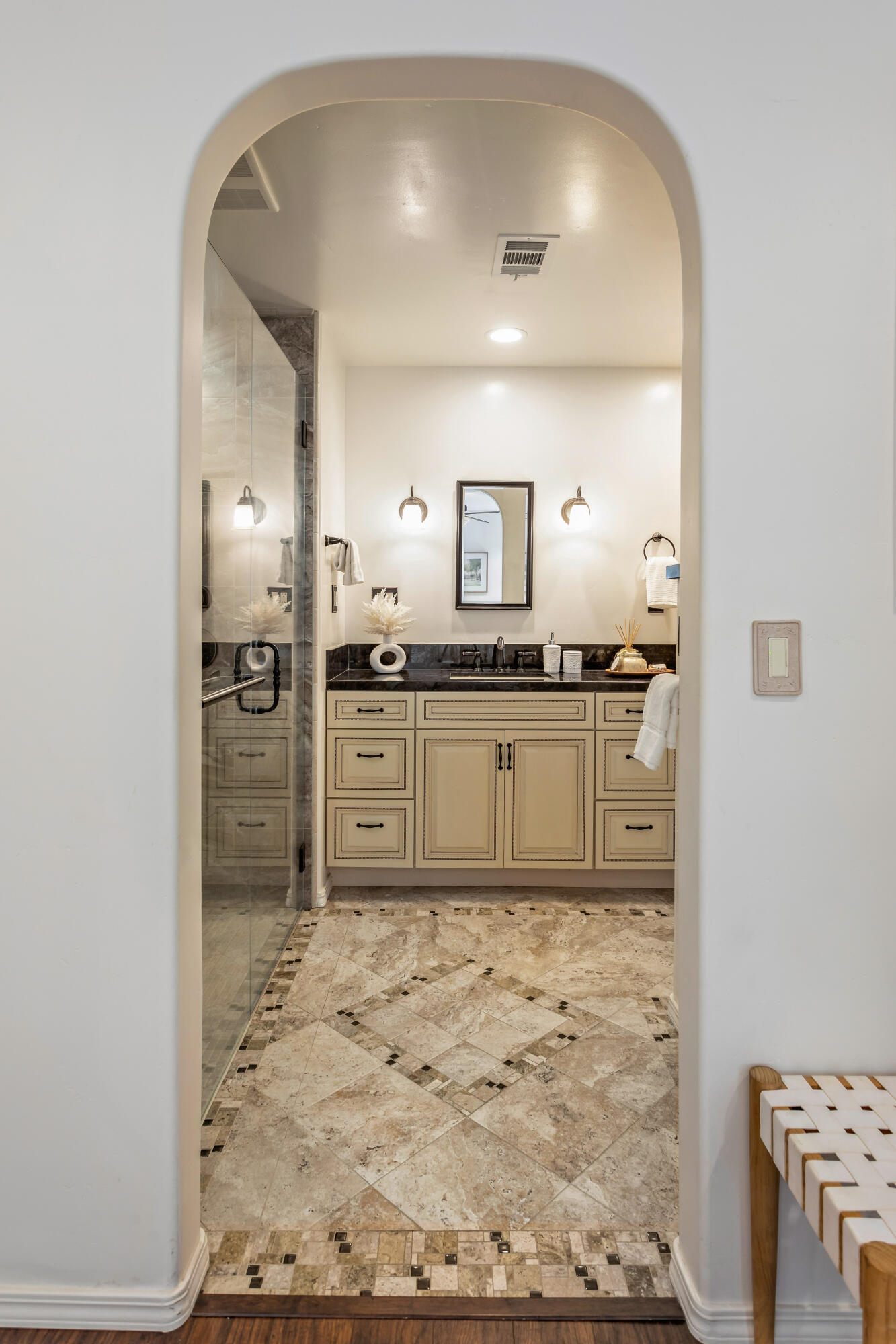253 Pebble Beach Drive Goleta, CA 93117 - Photo 13 of 27 a bathroom with a sink and a mirror