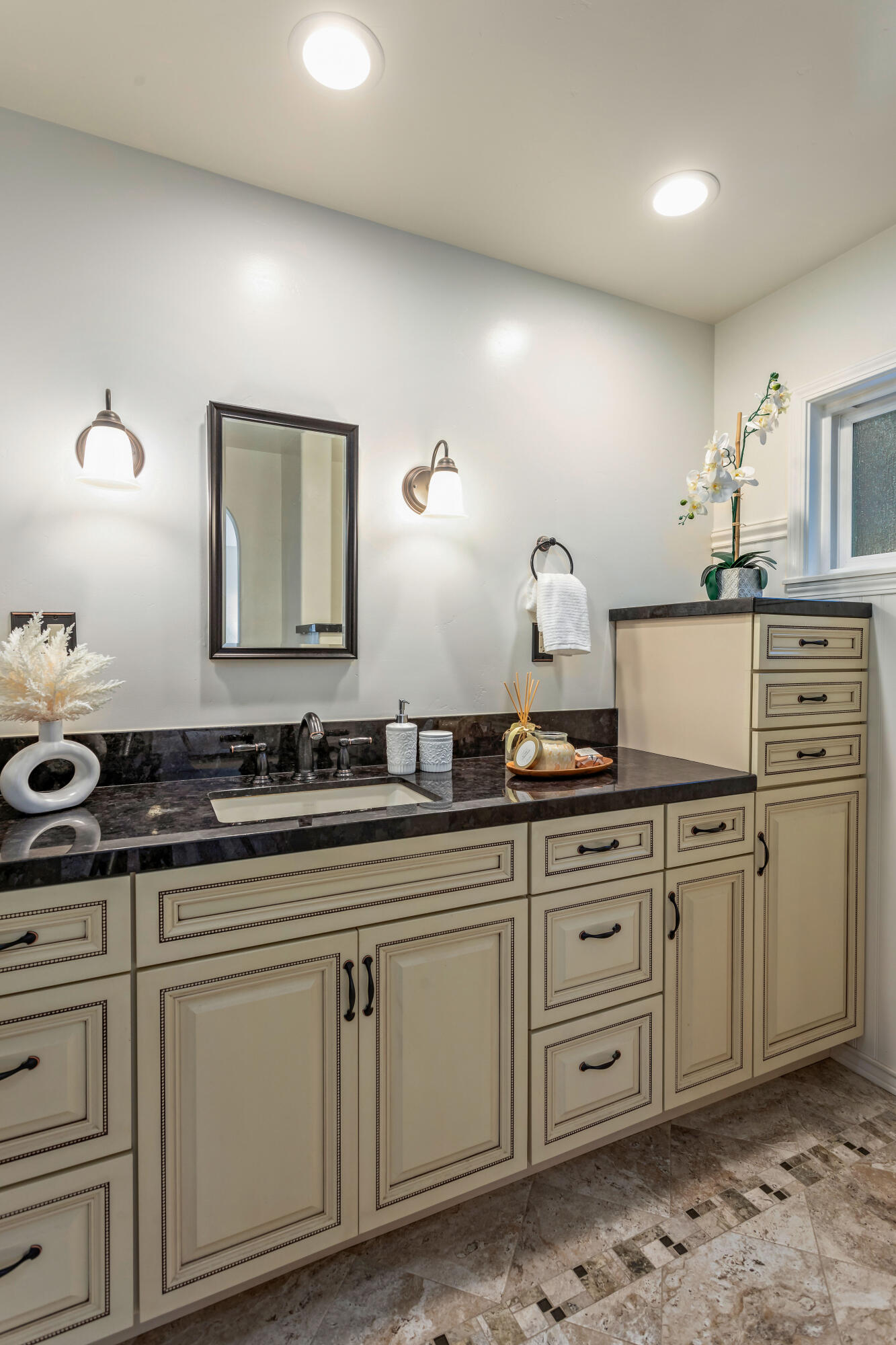 253 Pebble Beach Drive Goleta, CA 93117 - Photo 15 of 27 a kitchen with granite countertop a sink cabinets and stainless steel appliances
