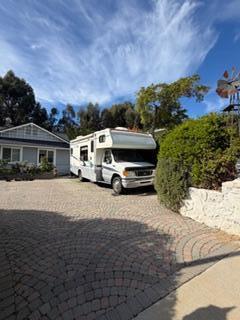 253 Pebble Beach Drive Goleta, CA 93117 - Photo 27 of 27 a car parked in front of a house