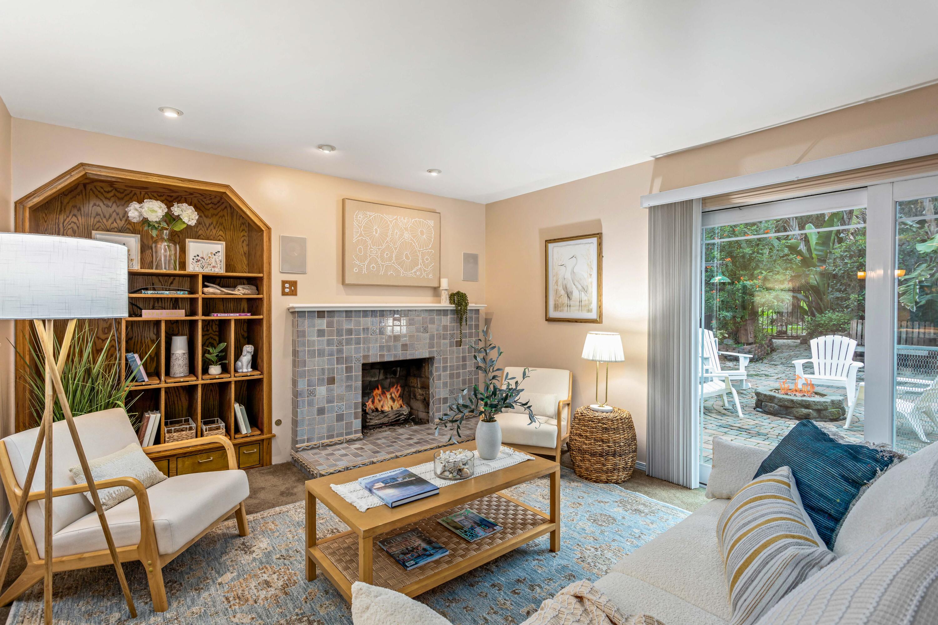 253 Pebble Beach Drive Goleta, CA 93117 - Photo 4 of 27 a living room with furniture and a fireplace