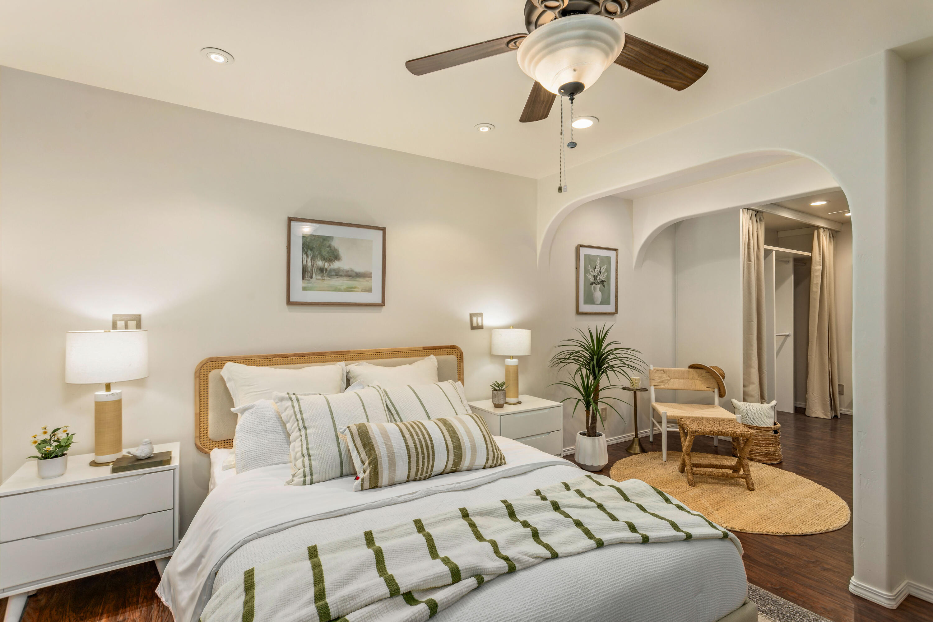 253 Pebble Beach Drive Goleta, CA 93117 - Photo 8 of 27 a bedroom with a bed and ceiling fan