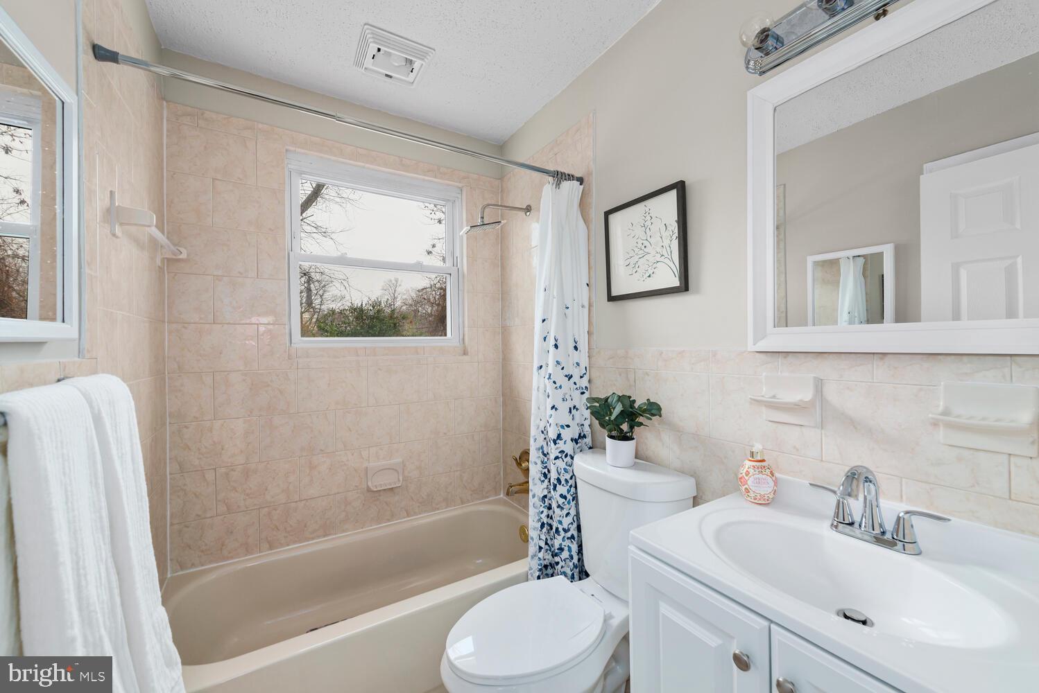 7405 Hallmark Place Springfield, VA 22150 - Photo 23 of 43 Full bath with new toilet, vanity