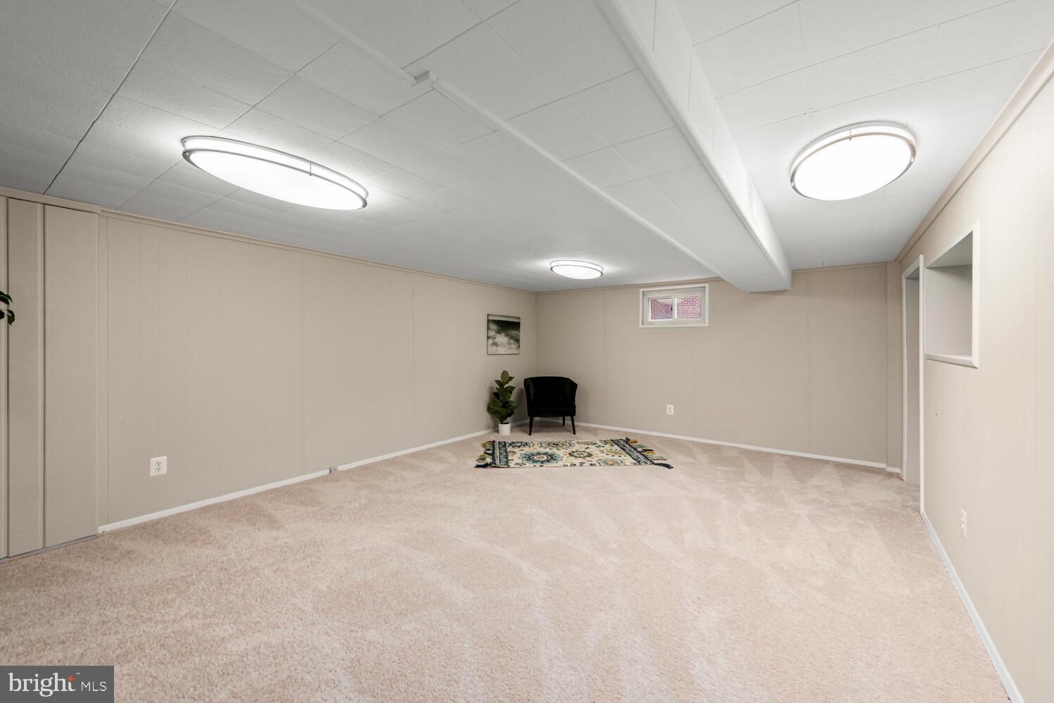 7405 Hallmark Place Springfield, VA 22150 - Photo 24 of 43 Spacious, carpeted family room