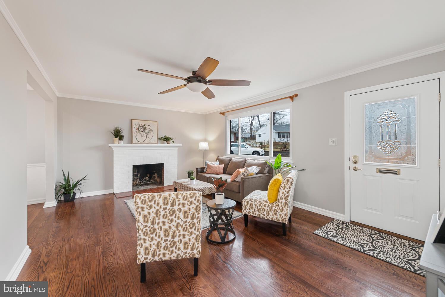 7405 Hallmark Place Springfield, VA 22150 - Photo 3 of 43 Step inside to welcoming living room