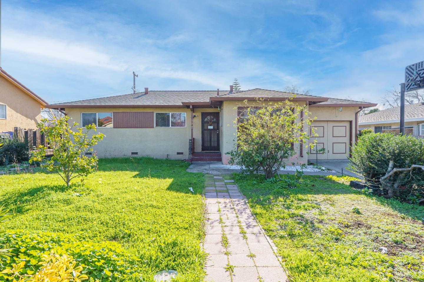 172 Manferd Street Milpitas, CA 95035 - Photo 1 of 45 a front view of a house with garden