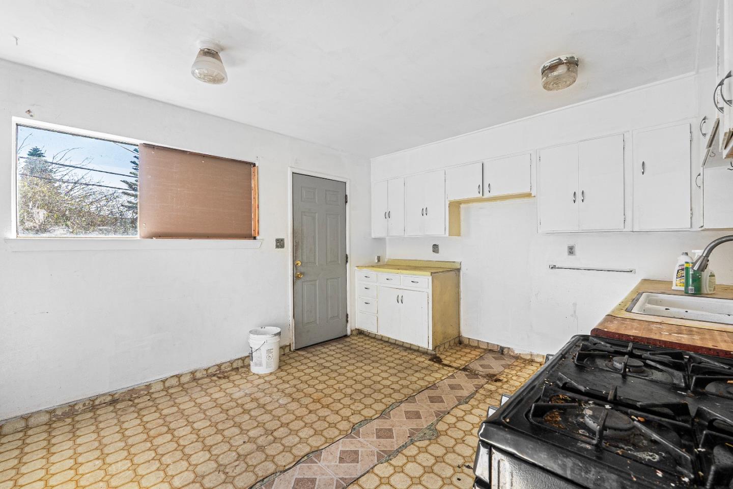 172 Manferd Street Milpitas, CA 95035 - Photo 30 of 45 a storage & utility room with a stove top oven