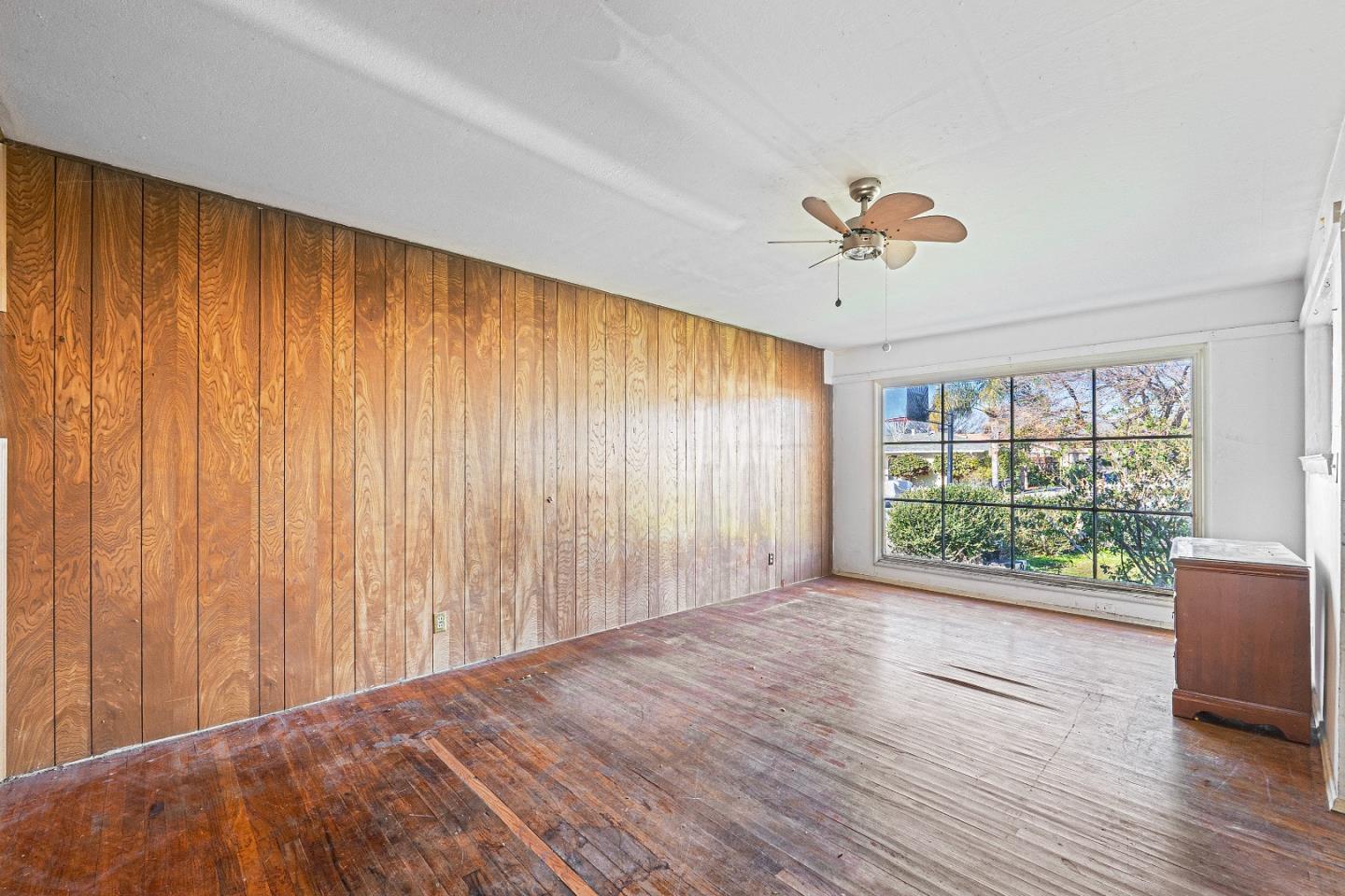 172 Manferd Street Milpitas, CA 95035 - Photo 5 of 45 wooden floor in an empty room with a window