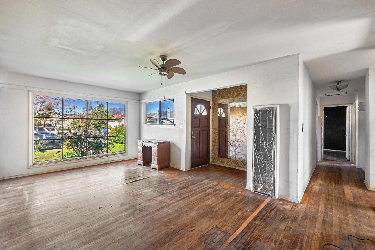 172 Manferd Street Milpitas, CA 95035 - Photo 6 of 45 a view of an empty room with a window