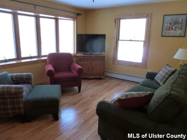 3 Durmo Road New Paltz, NY 12561 - Photo 11 of 17 a living room with furniture and a flat screen tv