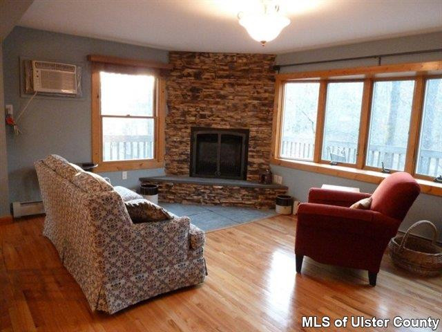 3 Durmo Road New Paltz, NY 12561 - Photo 8 of 17 a living room with furniture and a fireplace