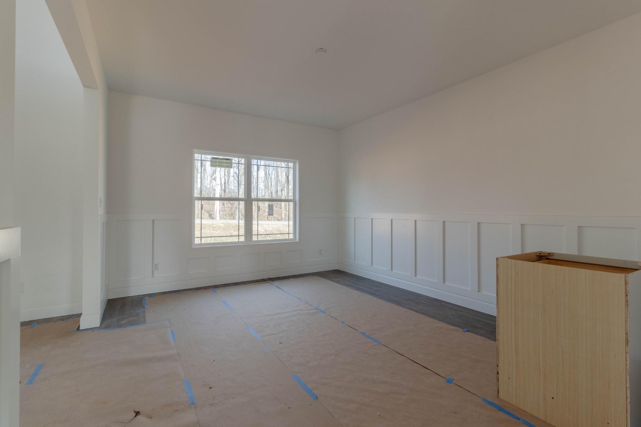 1436 Hickory Point Road Clarksville, TN 37043 - Photo 11 of 22 an empty room with a window and a refrigerator