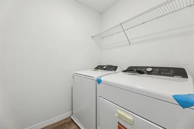 a utility room with dryer and washer