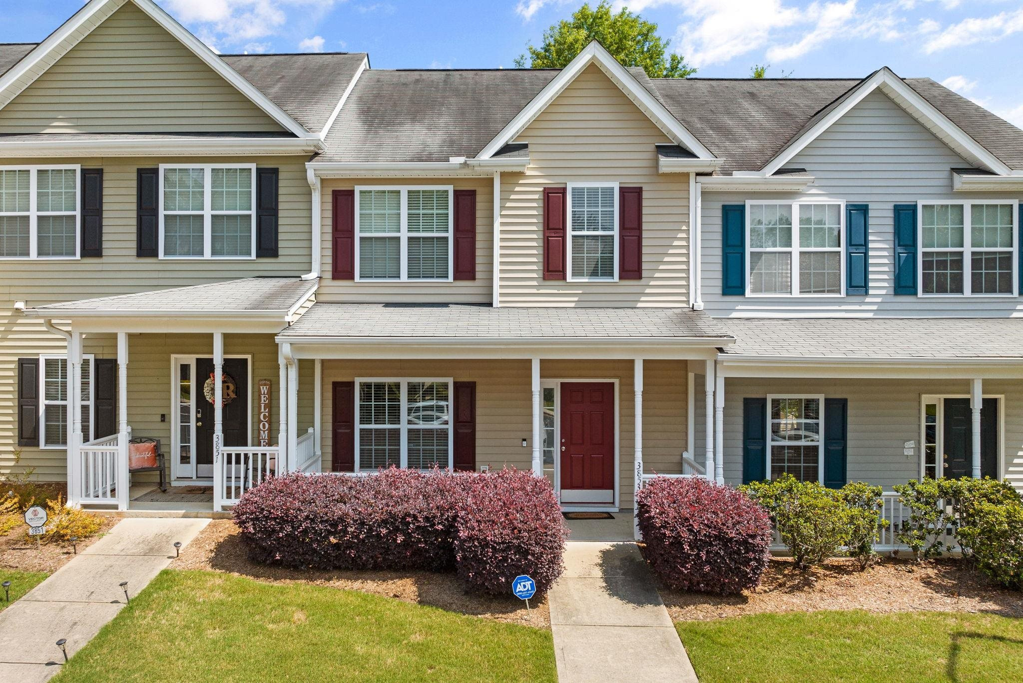 3853 Volkswalk Place Raleigh, NC 27610 - Photo 1 of 19 front view of a house with a yard