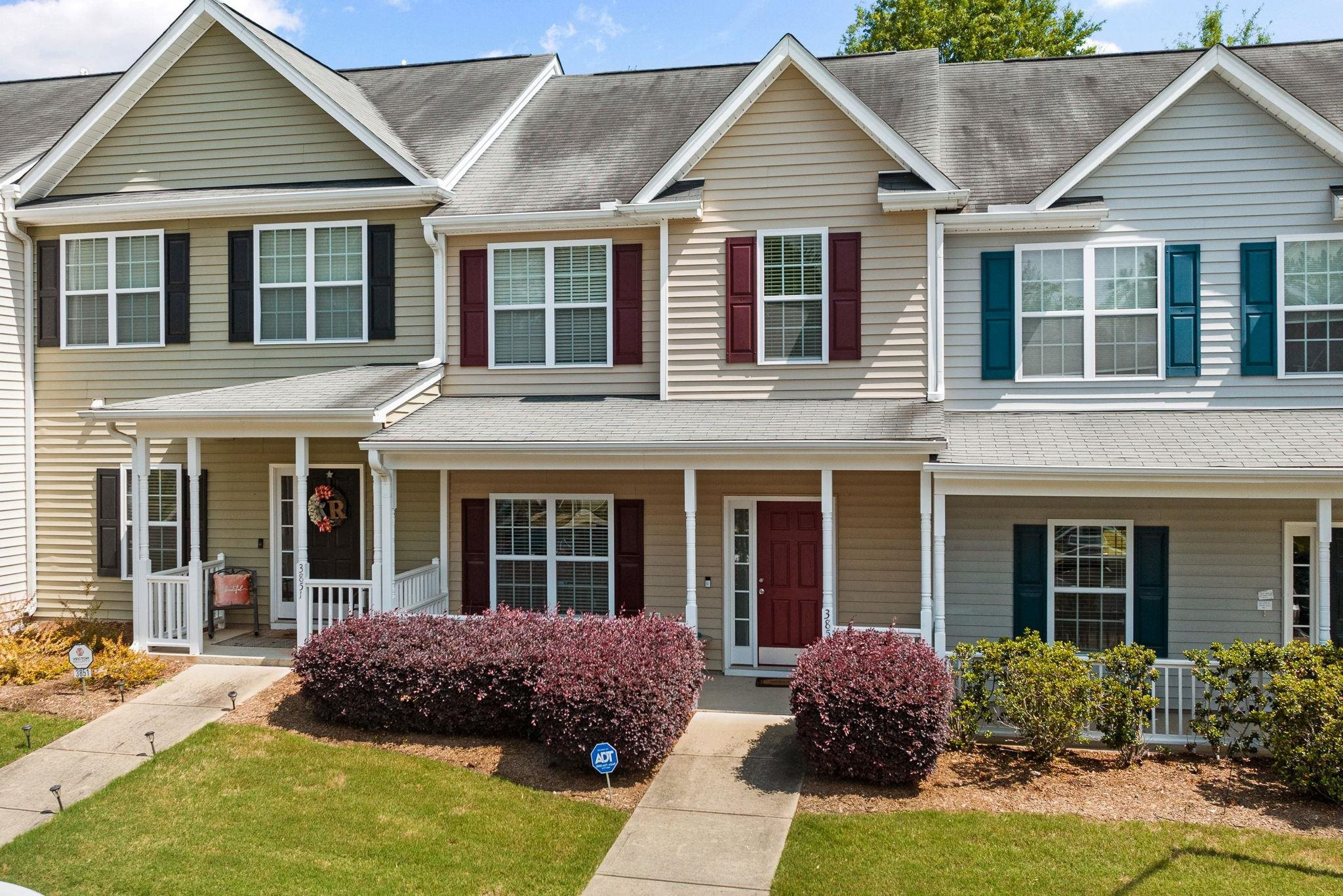 3853 Volkswalk Place Raleigh, NC 27610 - Photo 2 of 19 a front view of a house with yard and porch