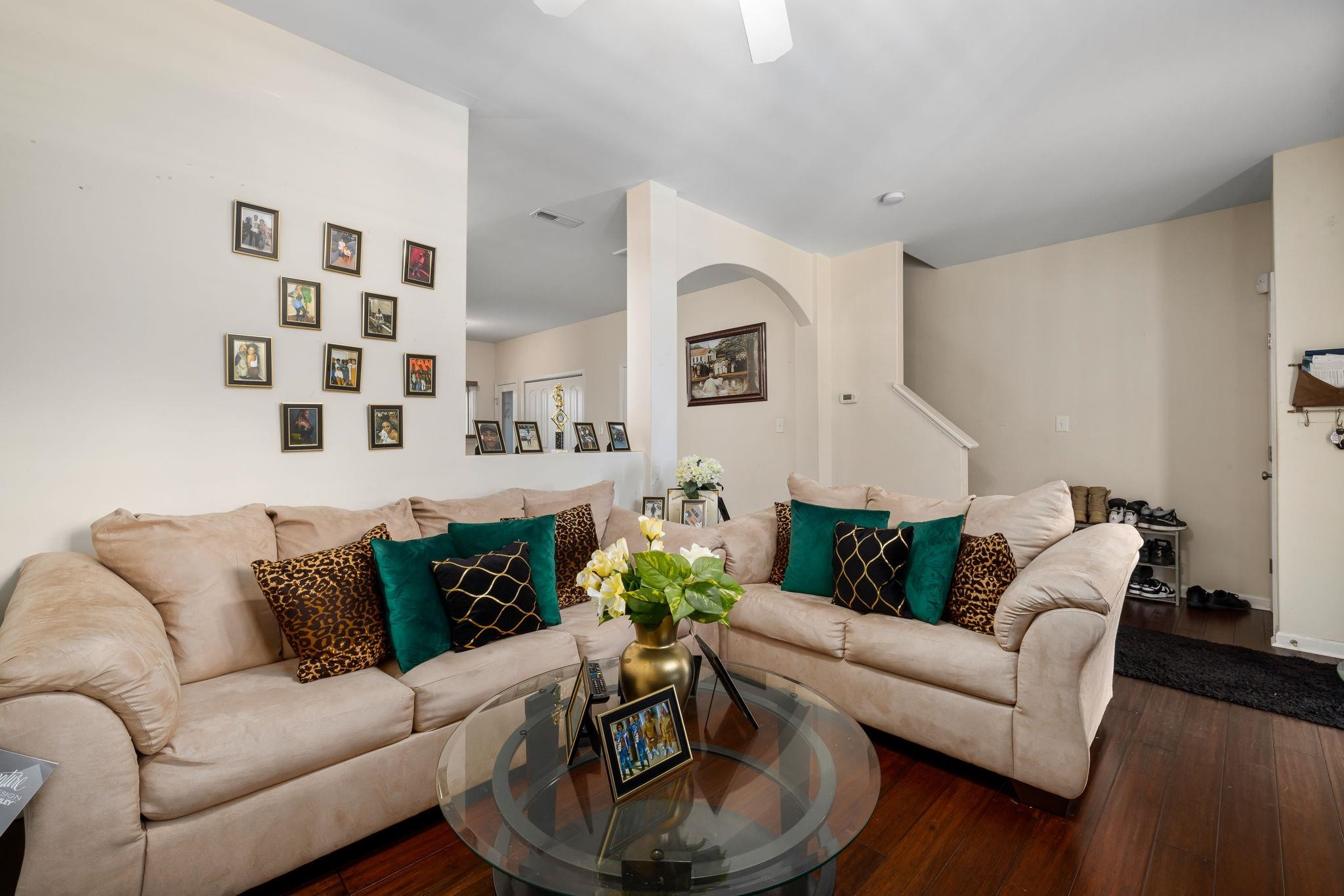 3853 Volkswalk Place Raleigh, NC 27610 - Photo 7 of 19 a living room with furniture and wooden floor
