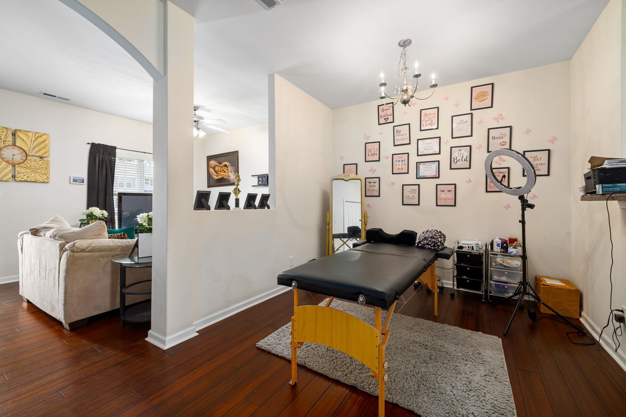 3853 Volkswalk Place Raleigh, NC 27610 - Photo 10 of 19 a living room with furniture and wooden floor
