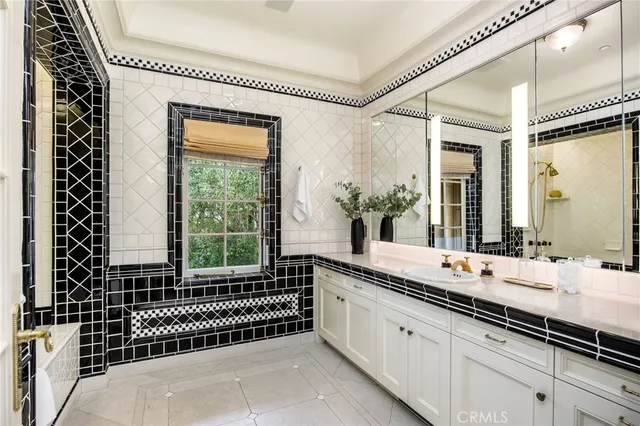 a bedroom with a bed rug and wall painting