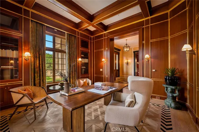 a room with furniture and chandelier