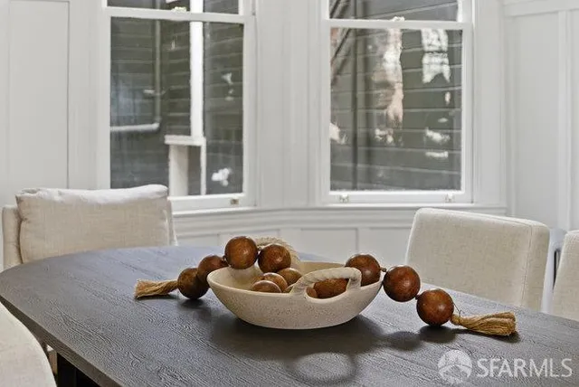 a living room with furniture and window