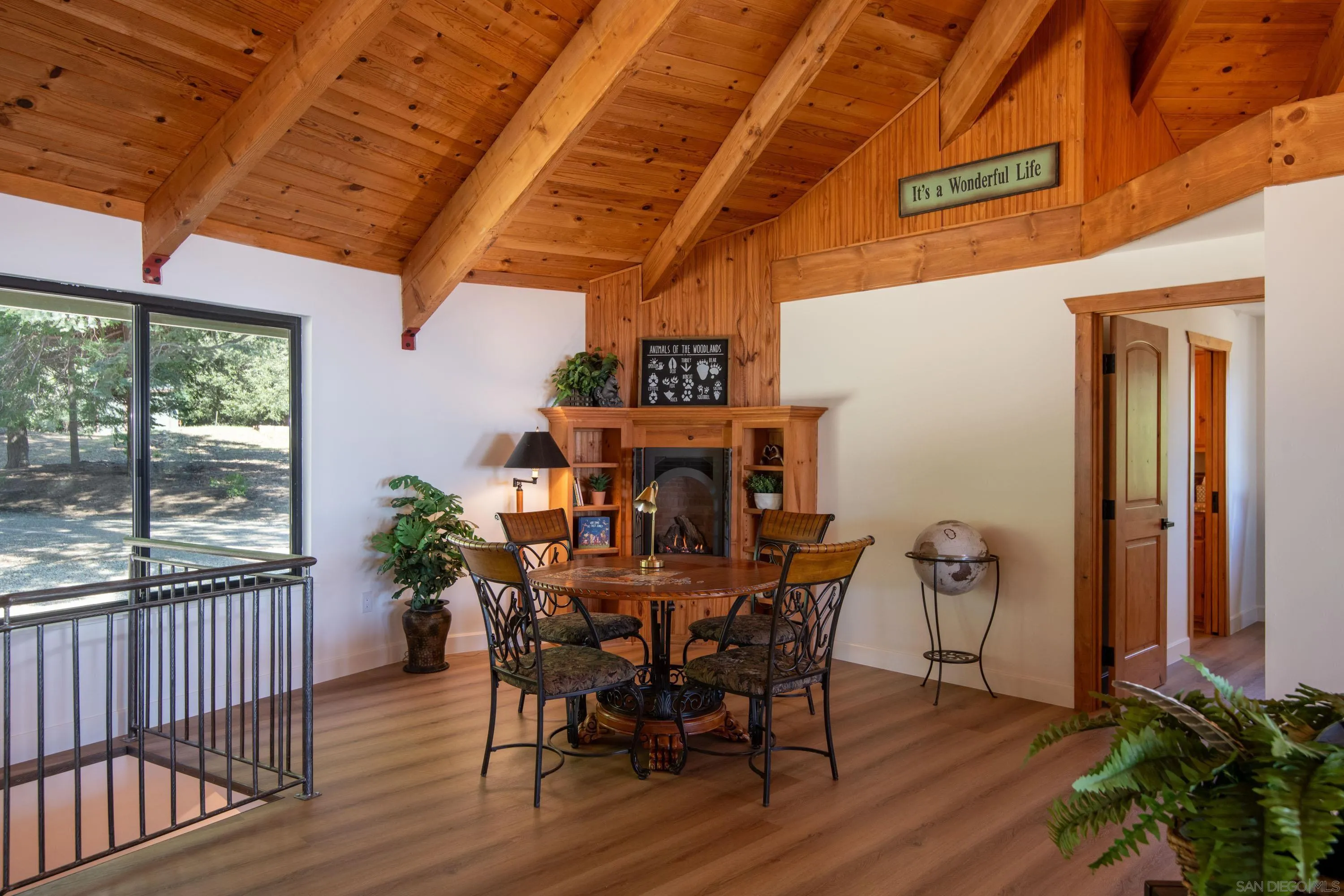 3413 Fern Meadow Road Palomar Mountain, CA 92060 - Photo 14 of 38 a view of a dining room with furniture window and wooden floor