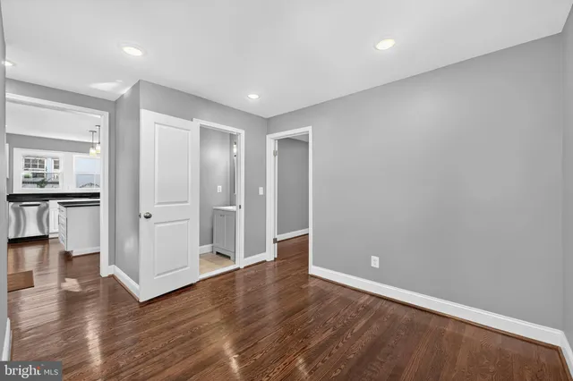 a bathroom with a sink a vanity and a mirror