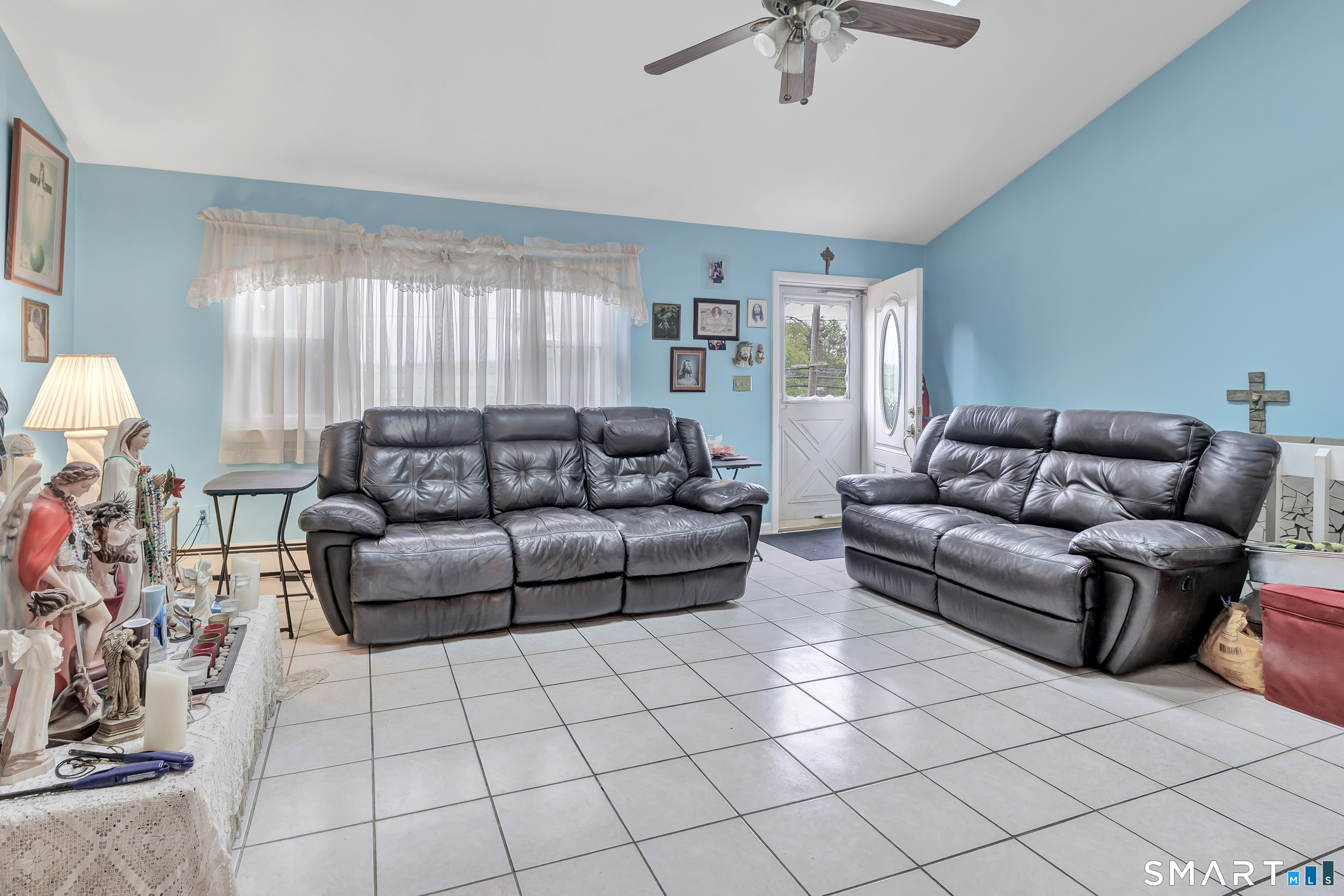 123 River Road Shelton, CT 06484 - Photo 2 of 27 a living room with furniture and a window