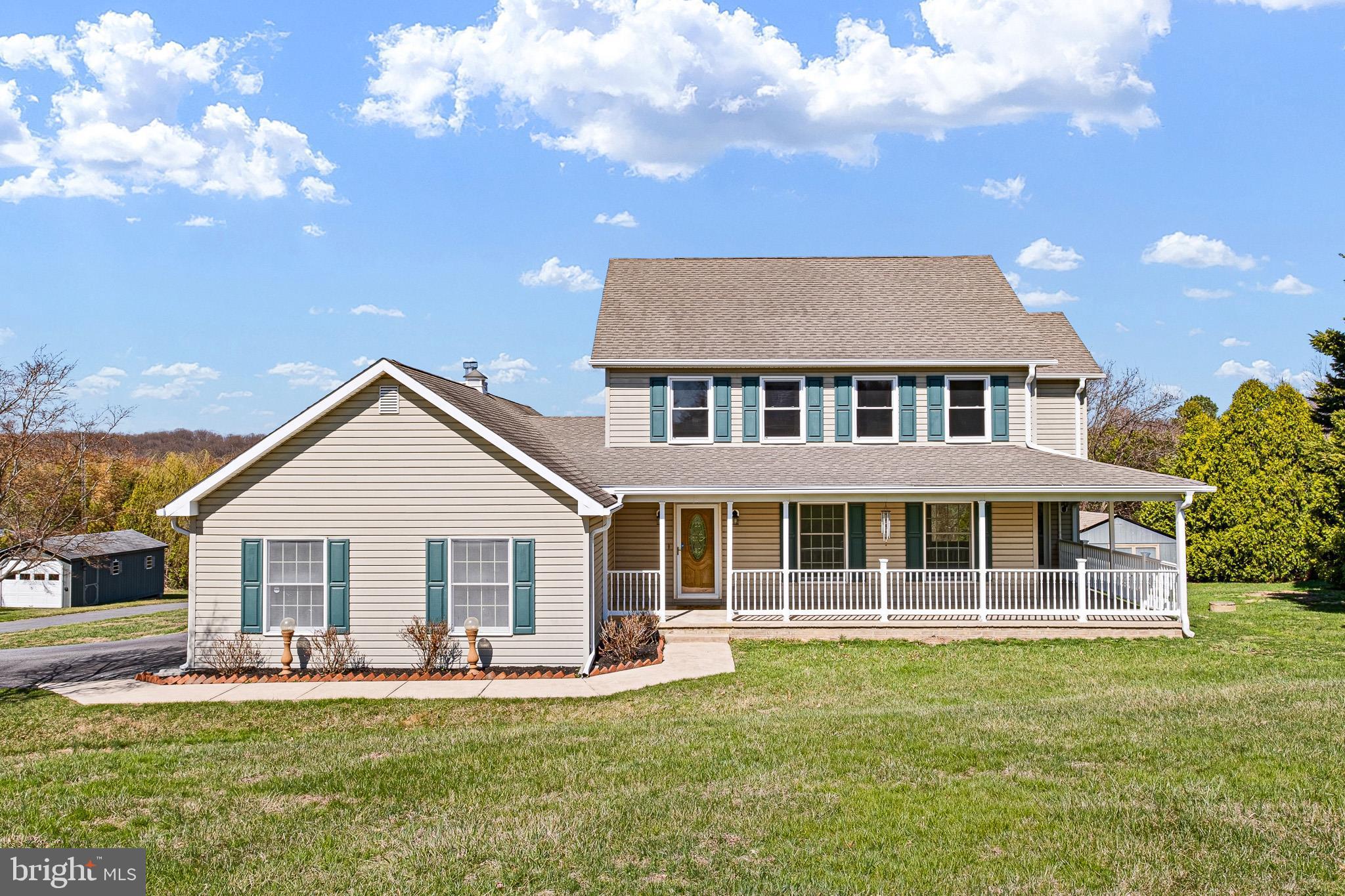 39 Long Drive Elkton, MD 21921 - Photo 1 of 39 a front view of a house with a garden