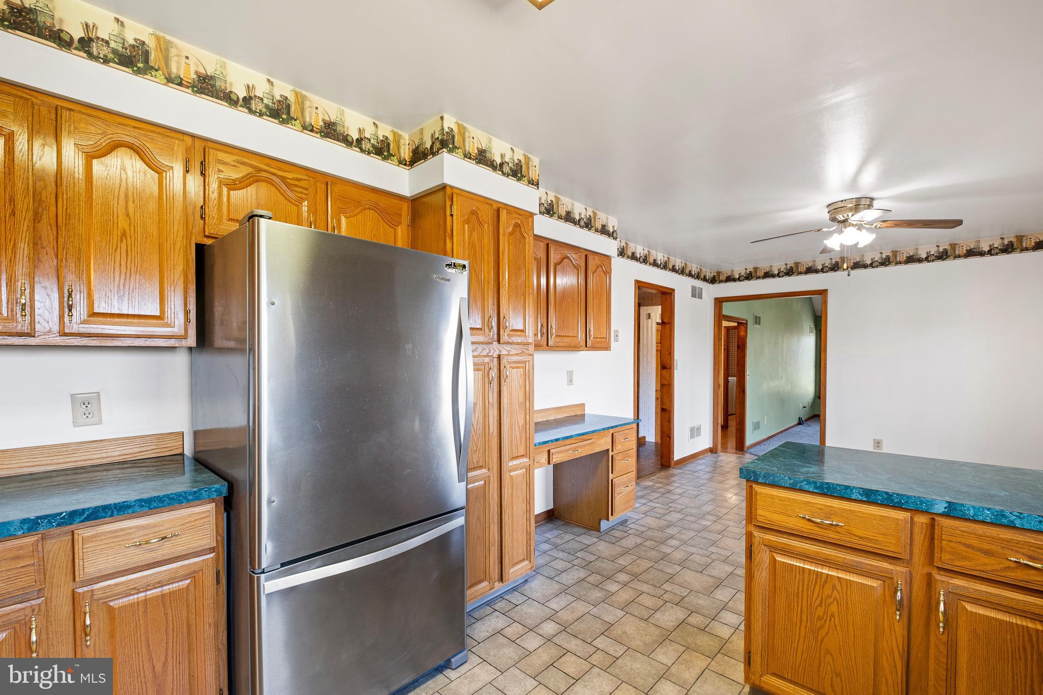 39 Long Drive Elkton, MD 21921 - Photo 16 of 39 a kitchen with stainless steel appliances granite countertop a refrigerator and a sink
