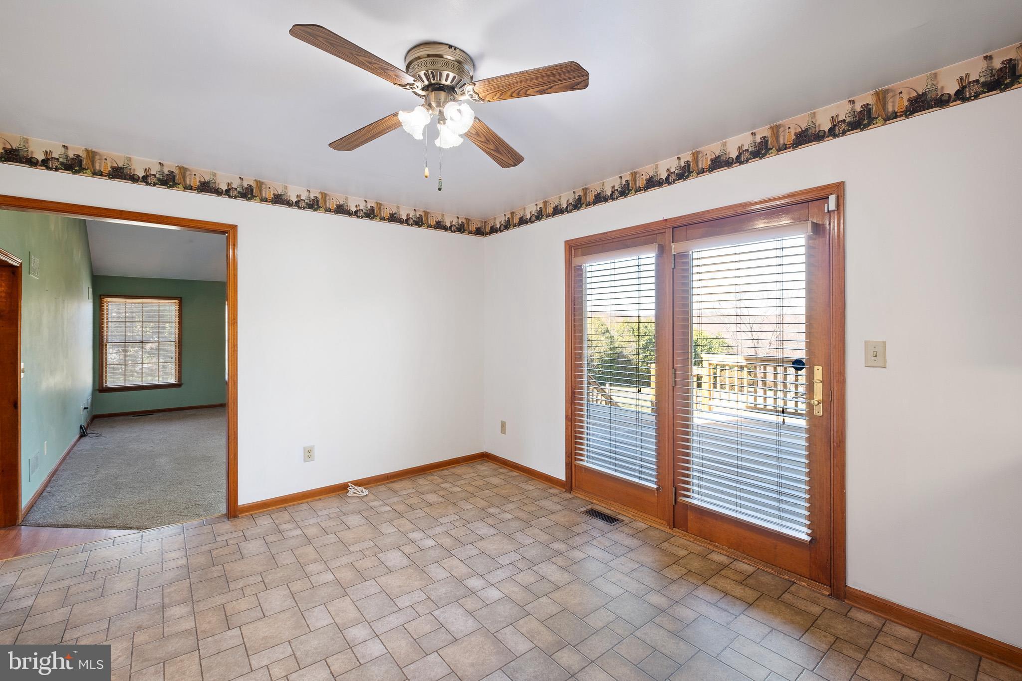 39 Long Drive Elkton, MD 21921 - Photo 18 of 39 a view of a livingroom with a ceiling fan and window