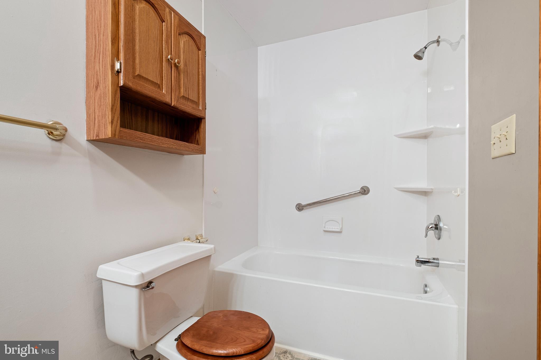 39 Long Drive Elkton, MD 21921 - Photo 33 of 39 a bathroom with a sink a toilet and bathtub