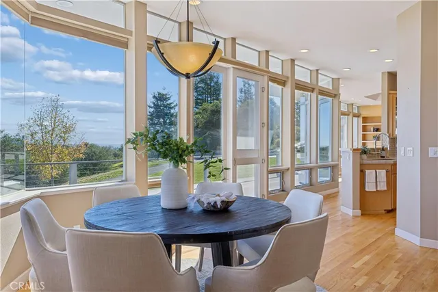 a bedroom with a large bed and a large window